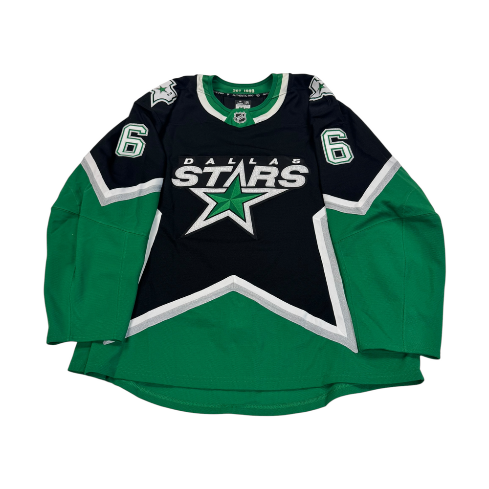 Dallas Stars hockey jersey with number 6 on sleeves. Jersey on a white background