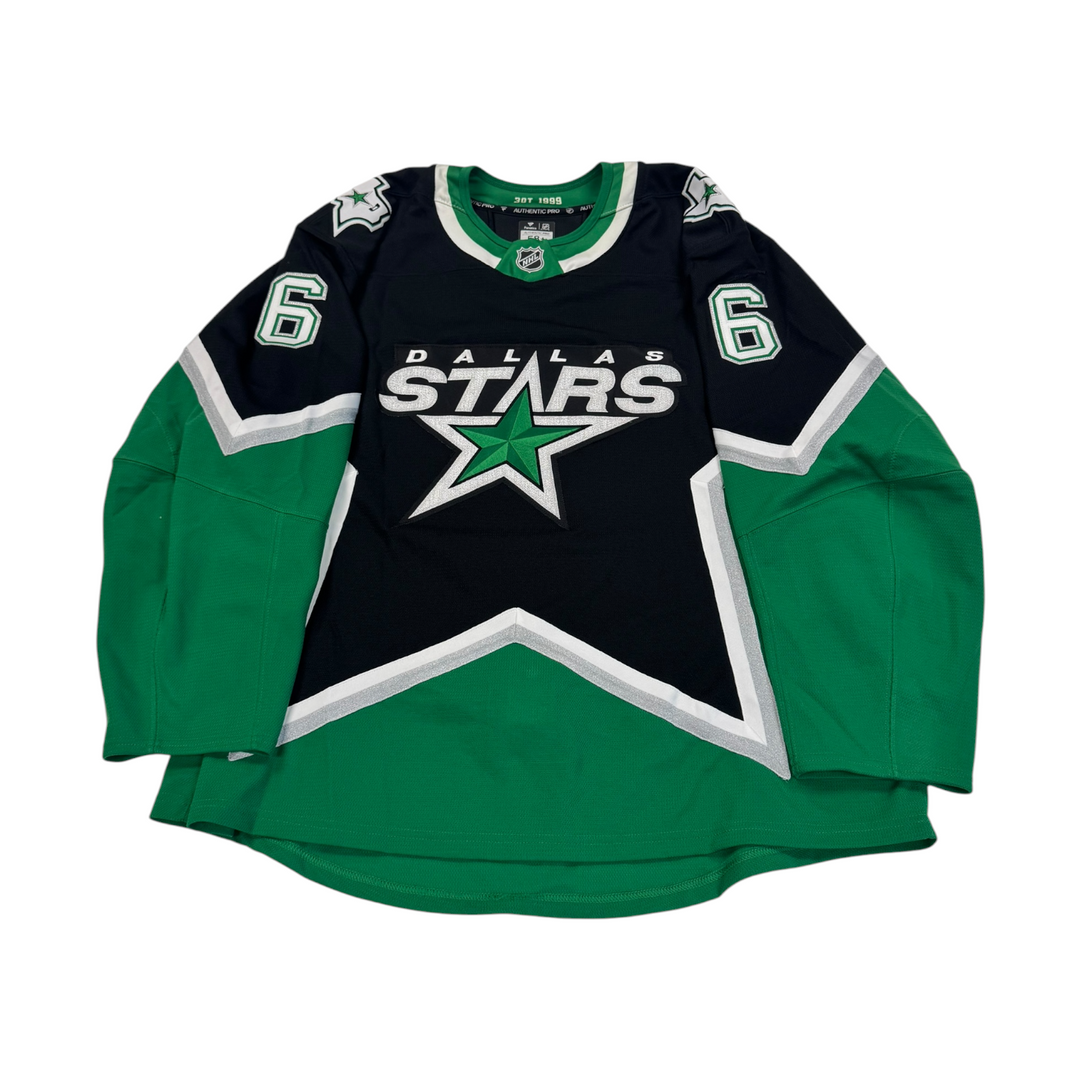 Dallas Stars hockey jersey with number 6 on sleeves. Jersey on a white background