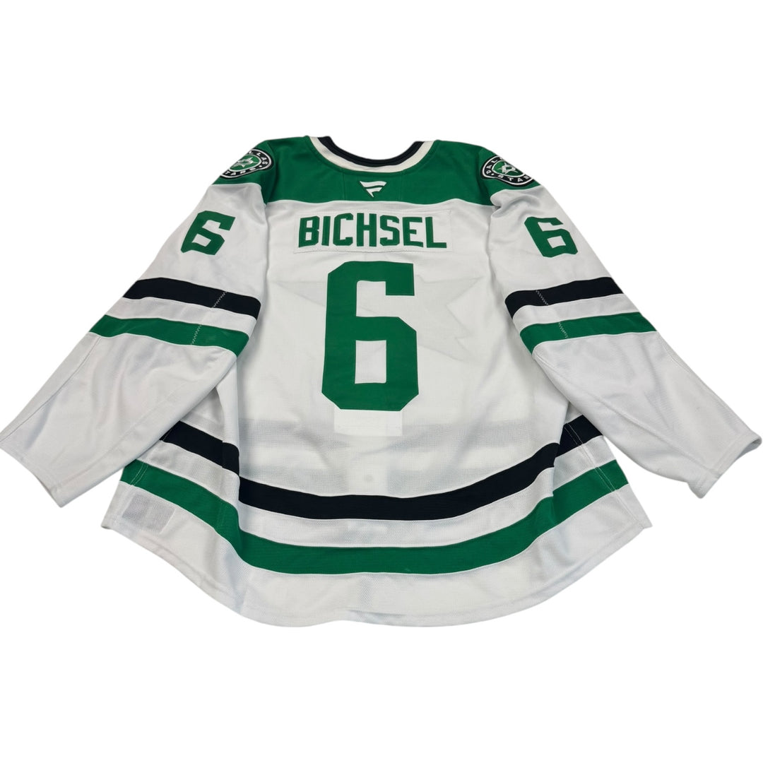 Game worn Dallas Stars away jersey with number 6 and name 'Bichsel' Jersey on a white background