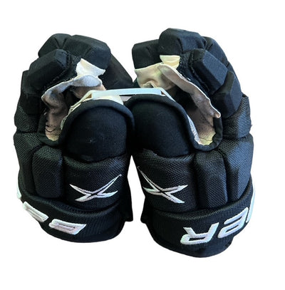 DALLAS STARS 2023 PLAYOFF ESA LINDELL GAME USED GLOVES - Side view of gloves