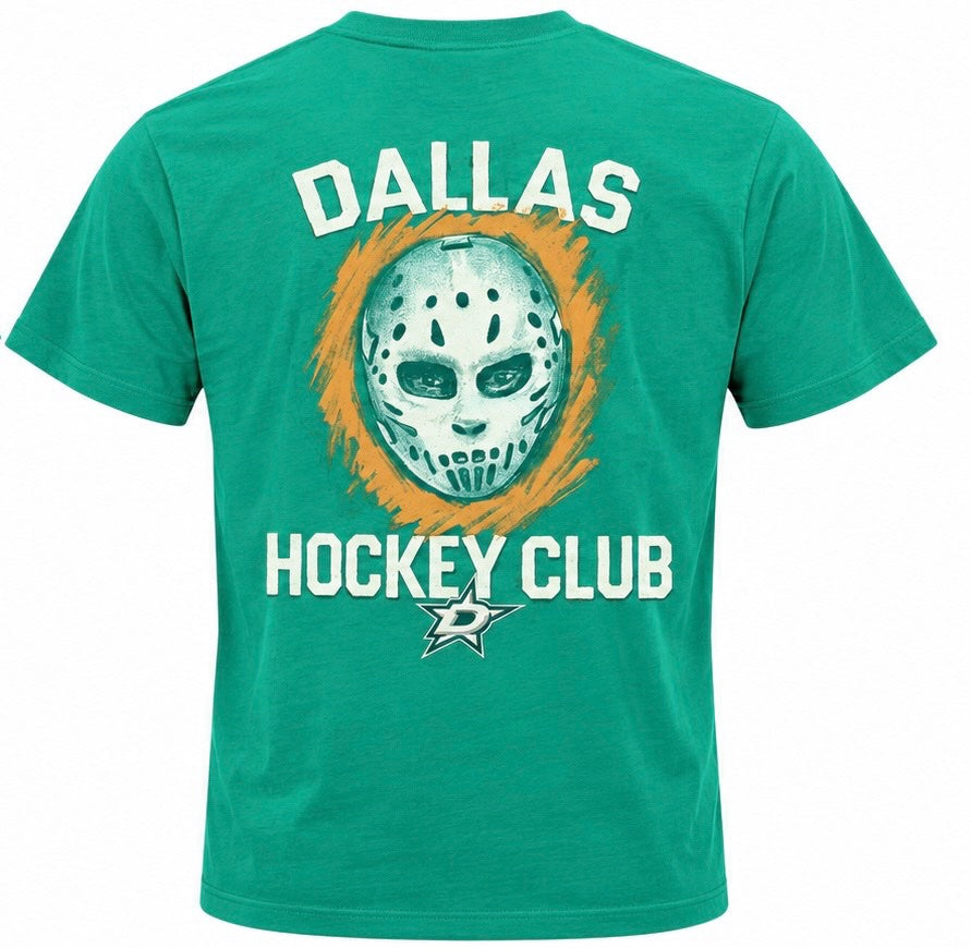 Kelly green short-sleeve Dallas Stars T-shirt shown from the back, featuring large white “DALLAS” lettering above a stylized hockey goalie mask graphic surrounded by orange brushstroke accents. Bold white “HOCKEY CLUB” lettering appears below, with a Dallas Stars logo underneath. White background.