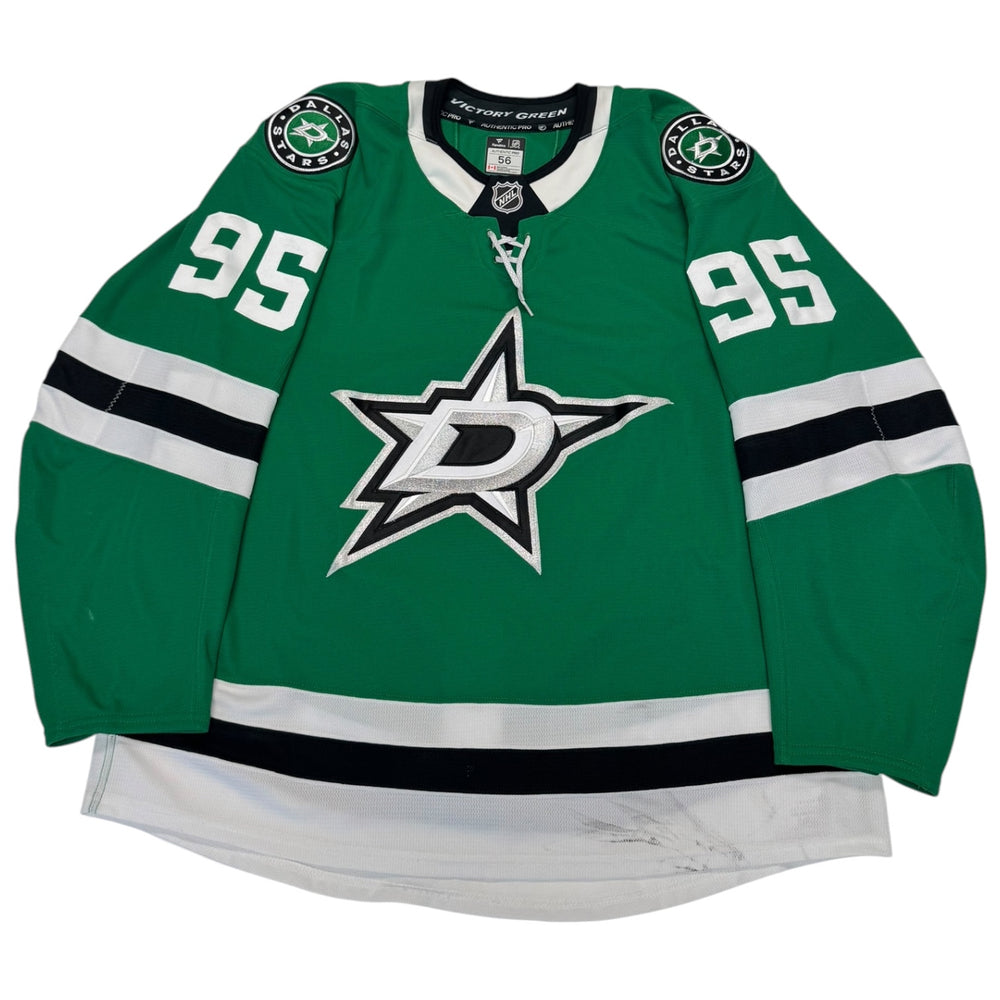 Green hockey jersey with number 95 and star logo on a white background