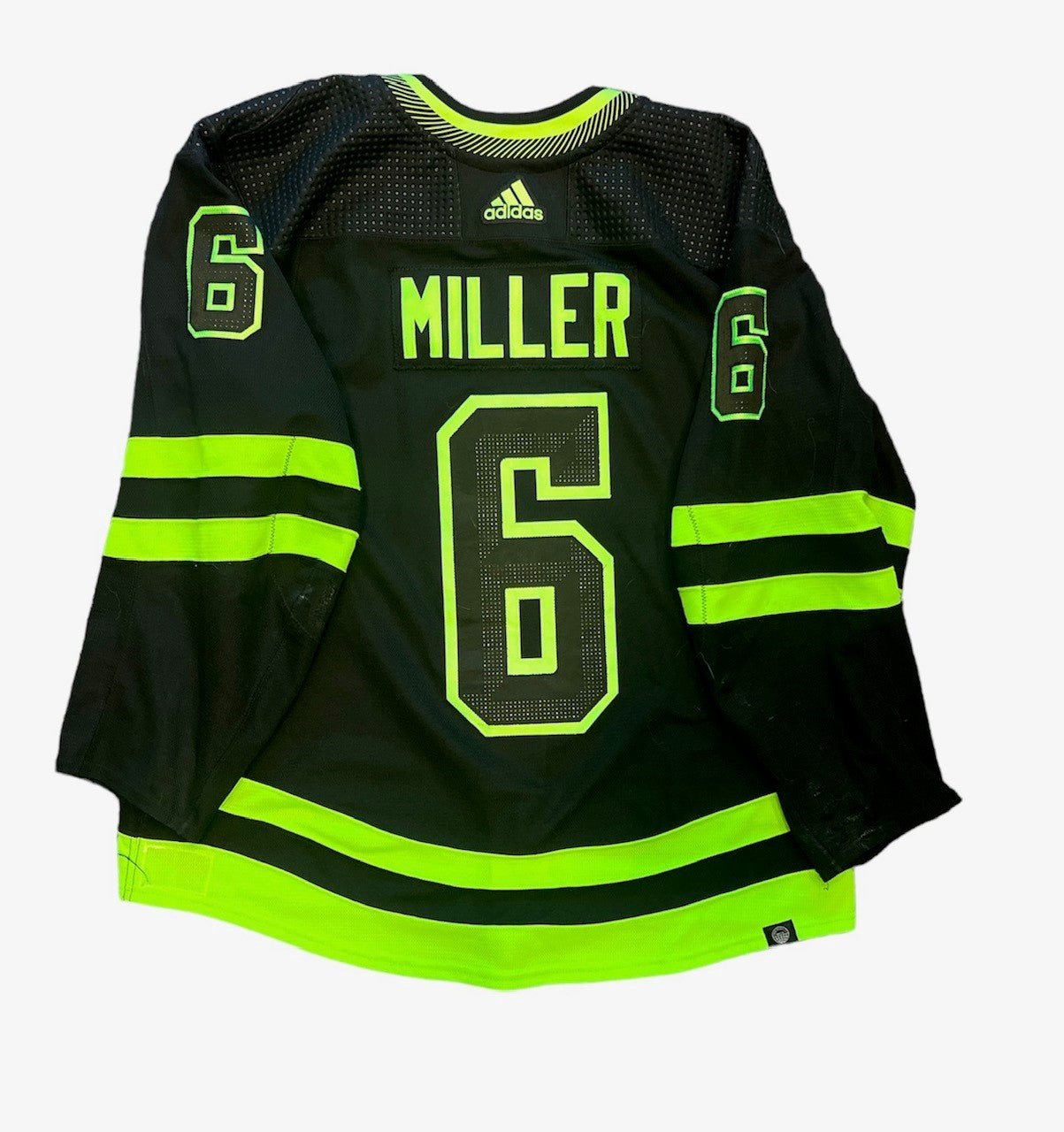 COLIN MILLER 2022-23 GAME WORN BLACKOUT JERSEY - BACK VIEW