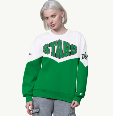 Person wearing a green and white 'STARS' sweatshirt on a white background