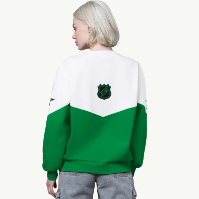 Person wearing a green and white sweatshirt on a white background