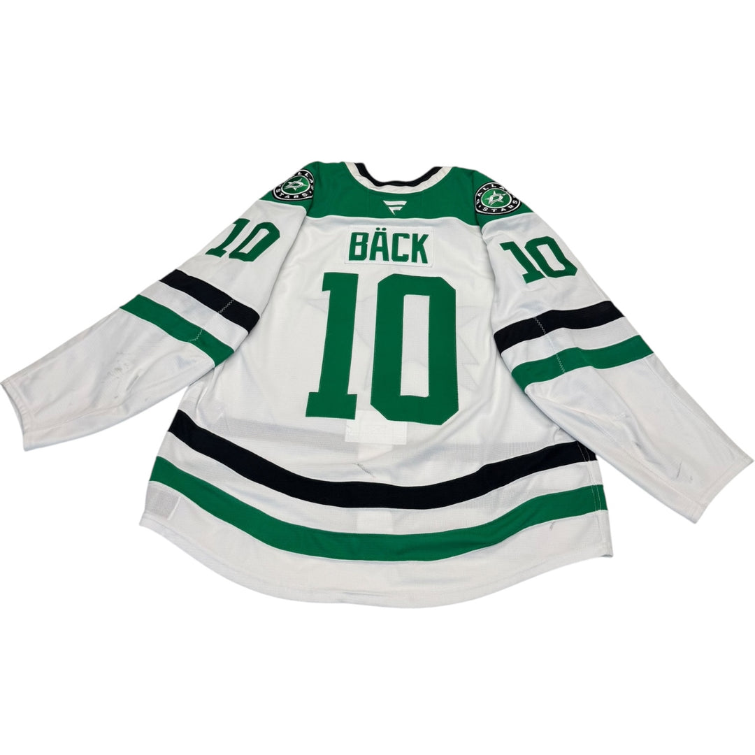 Game worn Dallas Stars Away jersey, number 10 on the back and sleeves. Bäck on jersey. Hockey jersey on a white background
