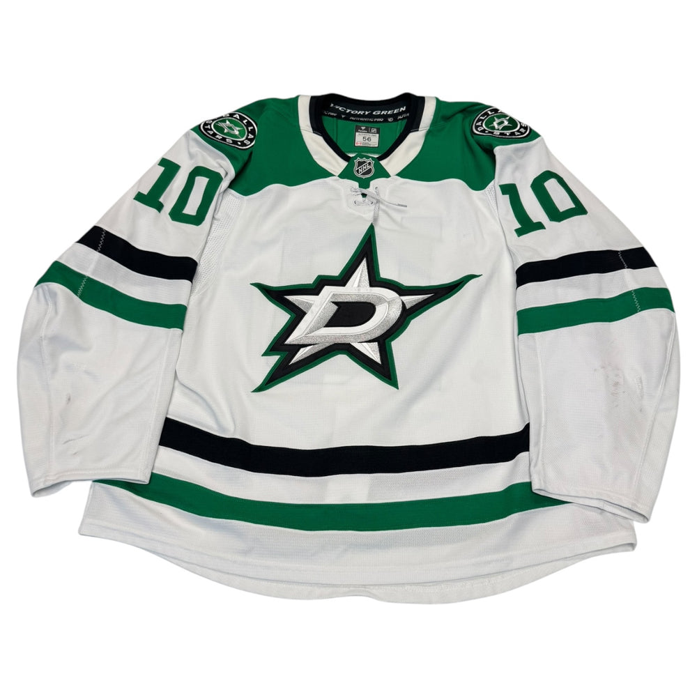 Game worn Dallas Stars Away jersey, number 10 on the sleeves with Dallas Stars logo on the chest. Hockey jersey on a white background
