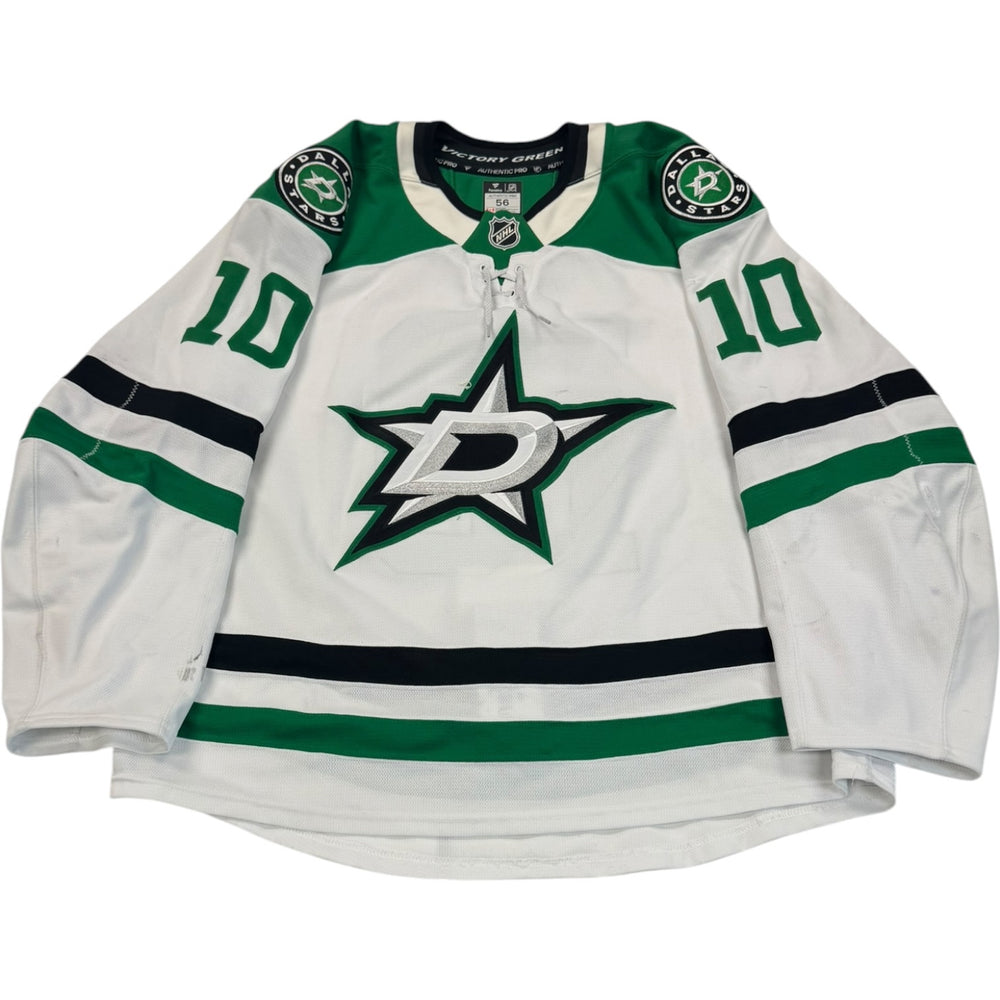 Game worn Dallas Stars Away jersey, number 10 on the sleeves with Dallas Stars logo on the chest. Hockey jersey on a white background
