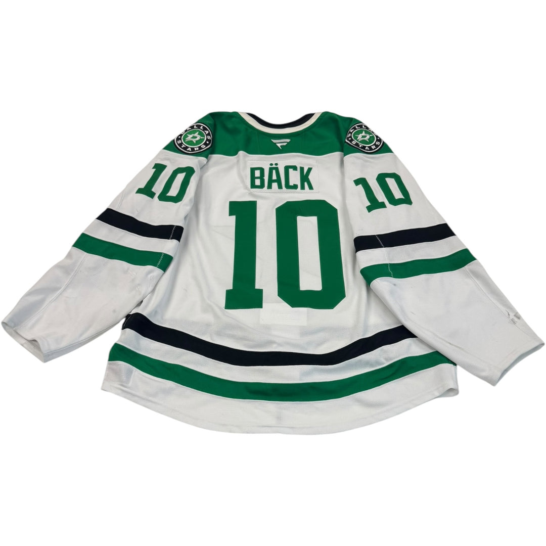 Game worn Dallas Stars away jersey with 'BACK" & number 10 on the back. Jersey on a white background