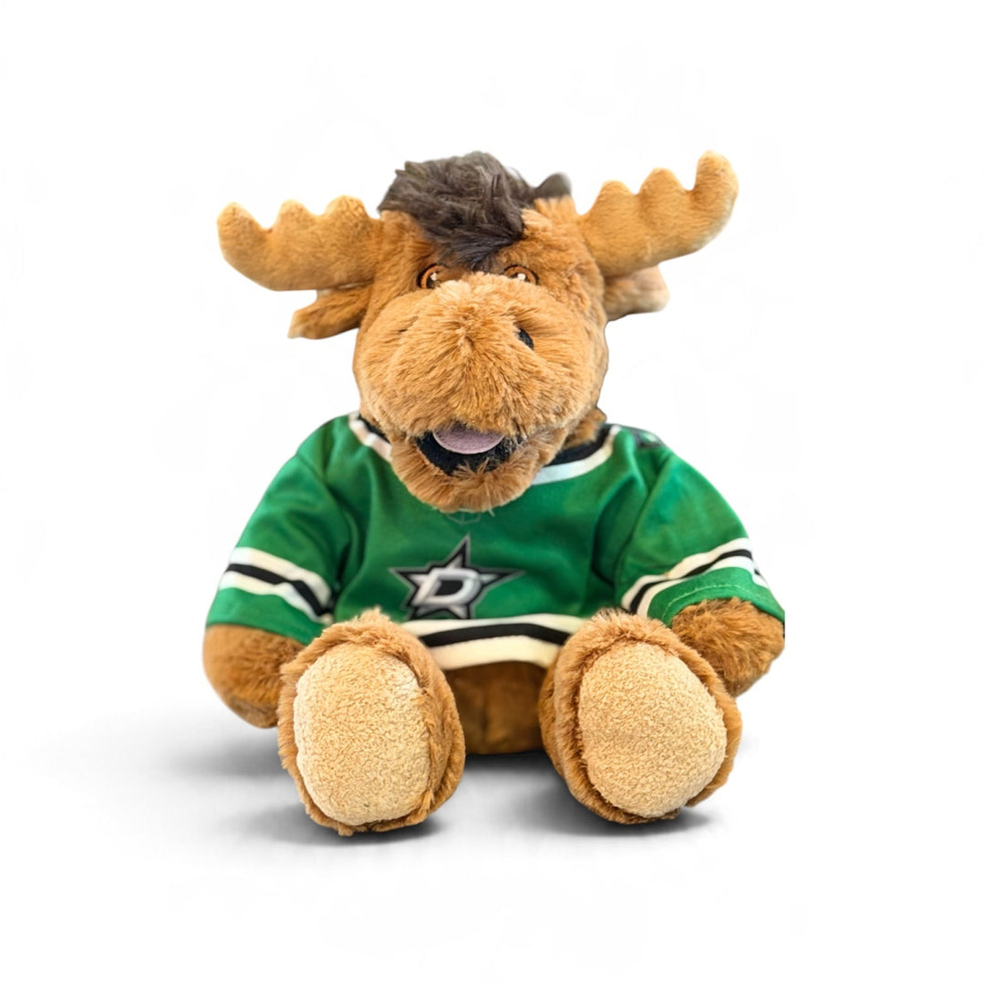 A plush moose toy wearing a green hockey-style jersey with white and black stripes and a star logo, photographed on a clean white background.