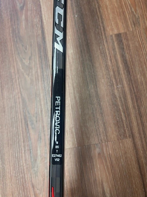 PETROVIC NEW CCM TEAM ISSUED STICK - View of name on stick