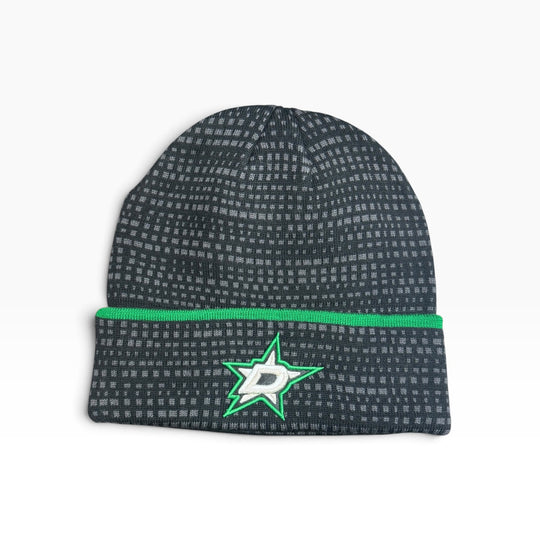 A dark gray beanie with a subtle grid pattern, featuring a bright green horizontal stripe and the Dallas Stars logo embroidered on the front cuff.