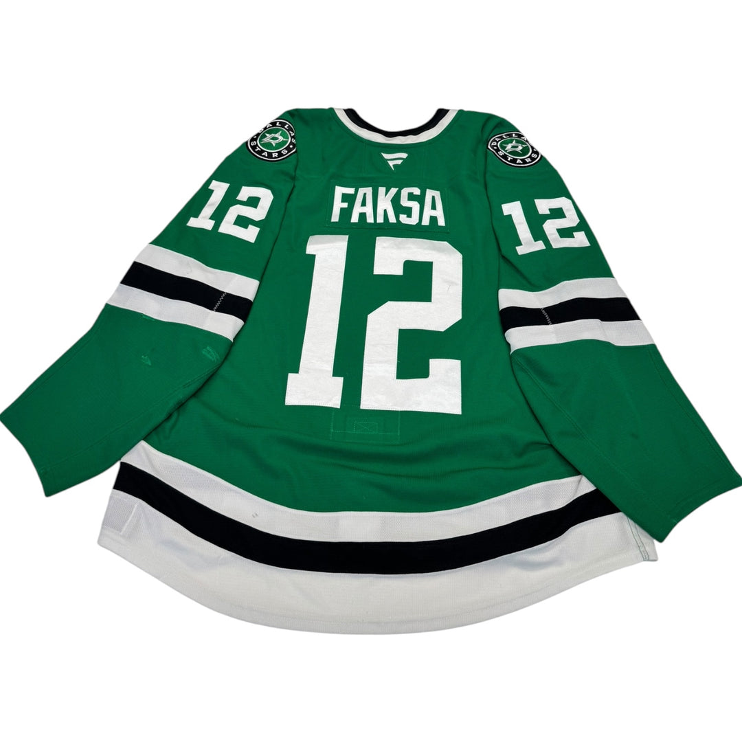 Game worn Dallas Stars home hockey jersey with number 12 and name 'Faksa' on a white background