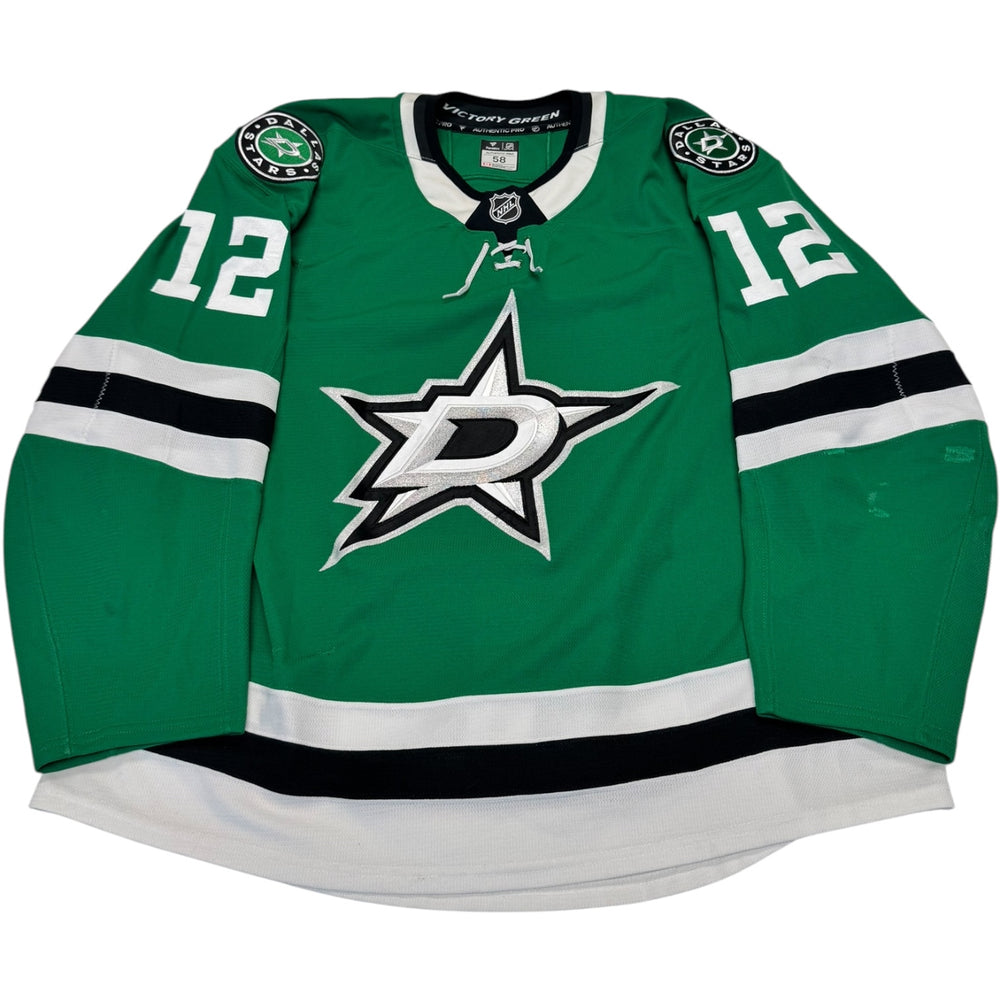 Green hockey jersey with number 12 and star logo on a white background