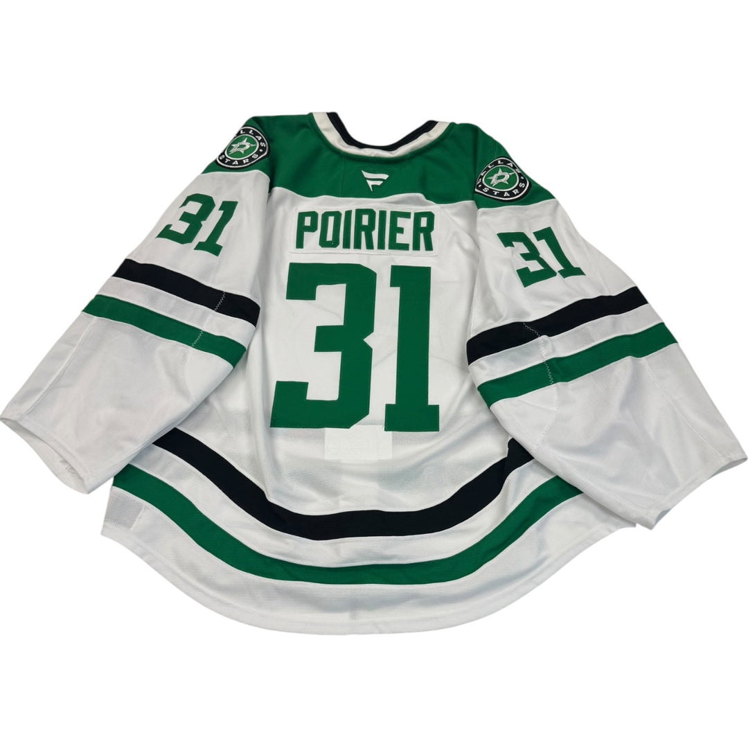 Game worn Dallas Stars away jersey with number 31 and name 'Poirier'. jersey on a white background