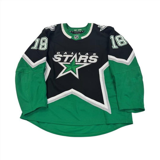 Dallas Stars hockey jersey with number 18 on SLEEVES. jersey ON a white background