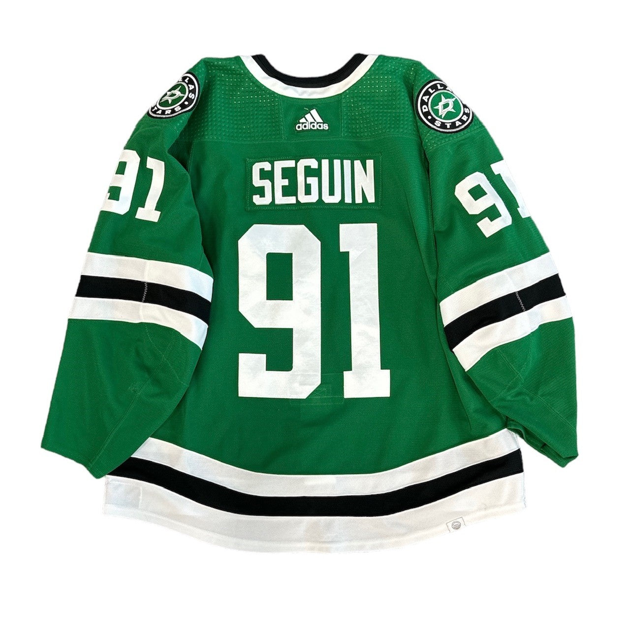 PHOTO OF BACK OF SEGUIN GAME USED HOME JERSEY