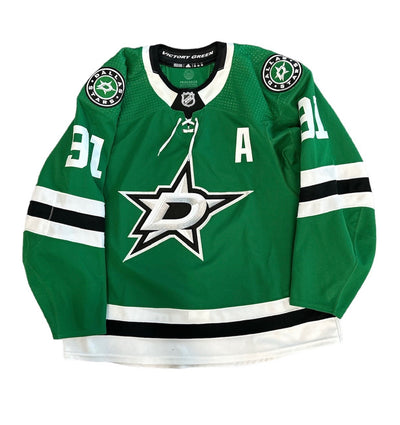 PHOTO OF FRONT OF SEGUIN GAME USED HOME JERSEY