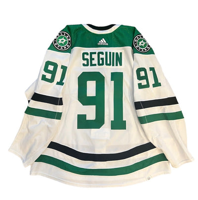 PHOTO OF TYLER SEGUIN 2023-24 GAME WORN SET 2 AWAY JERSEY - BACK VIEW