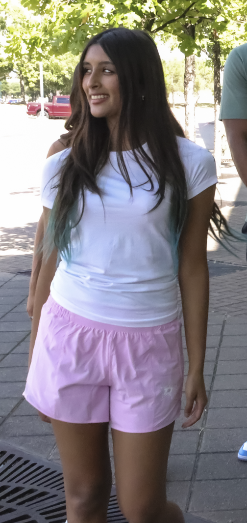 Photo of model wearing Lululemon Dallas Stars Pink Hot Shorts