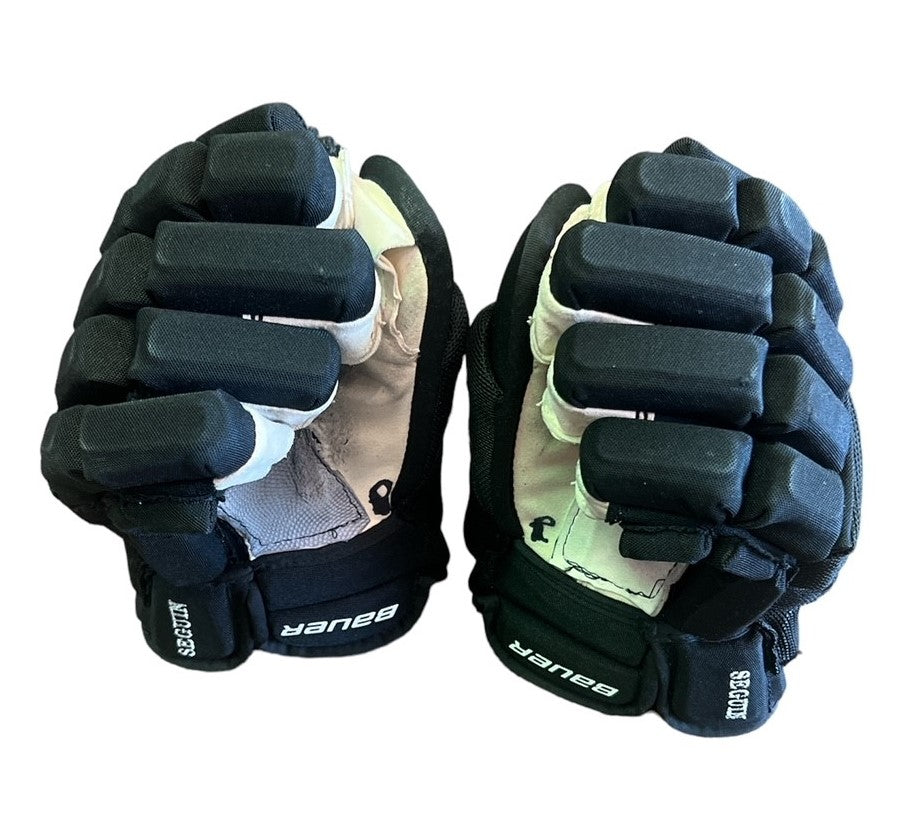 DALLAS STARS 2023 PLAYOFF TYLER SEGUIN GAME USED GLOVES - Side view of gloves