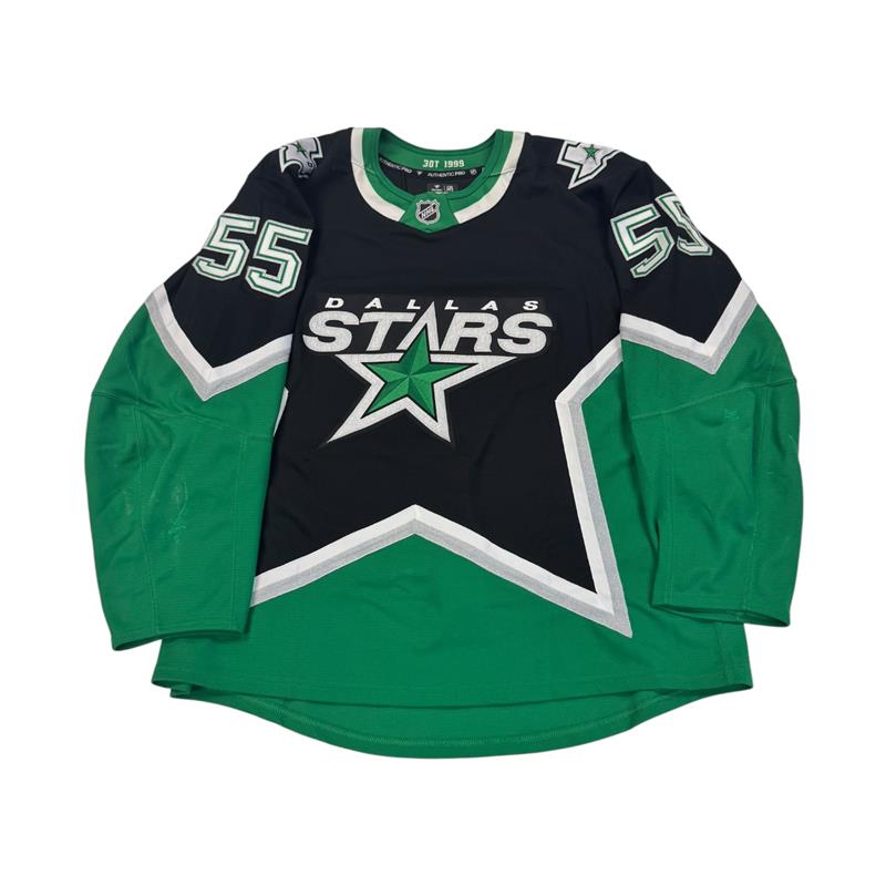 Dallas Stars hockey jersey with number 55 on Sleeves. Jersey on a white background