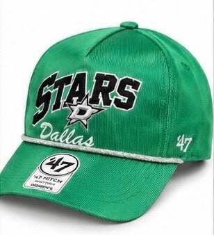 A green Dallas Stars baseball cap by &