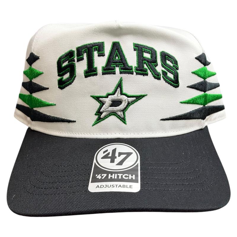 Dallas Stars white and black 47 Hitch adjustable cap featuring bold embroidered “STARS” lettering, the Stars logo, and distinctive green and black geometric accents along the sides.