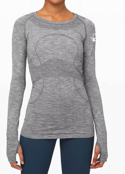MODEL IS WEARING DALLAS STARS LULULEMON WOMENS SWIFTLY LONG SLEEVE SHIRT GREY 