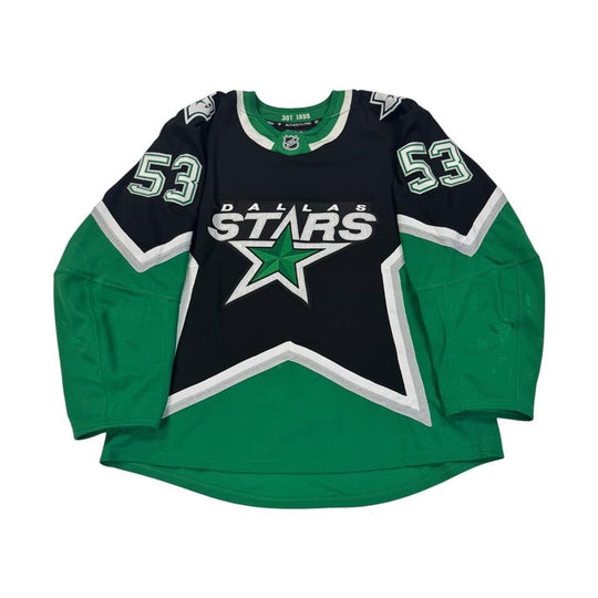 Dallas Stars hockey jersey with number 53 on sleeves. Jersey on a white background